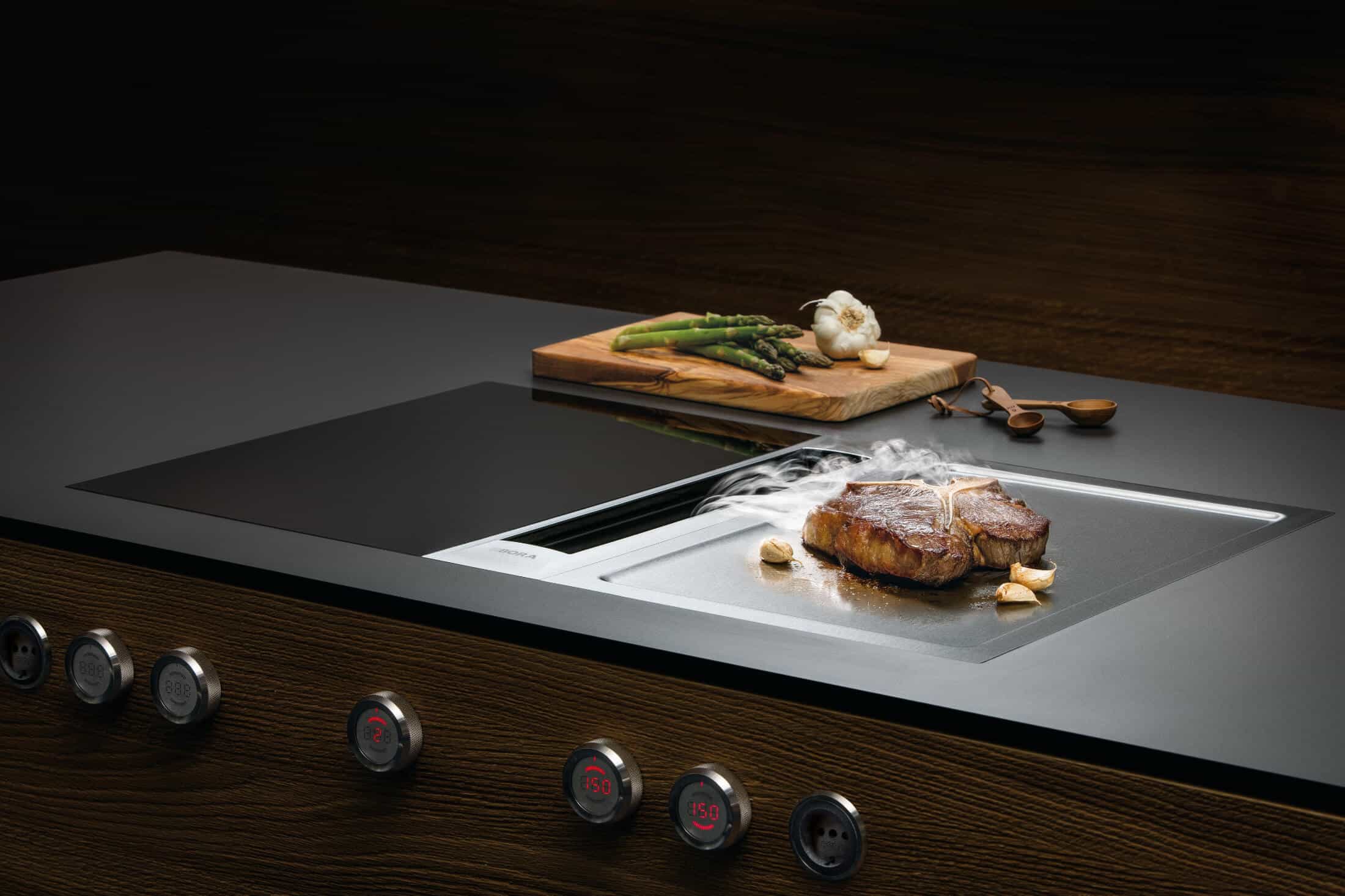 Een kookplaat met afzuiging kopen: de voor- en nadelen